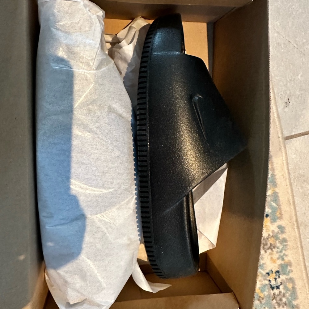 Nike women’s Black Slide Sandals
